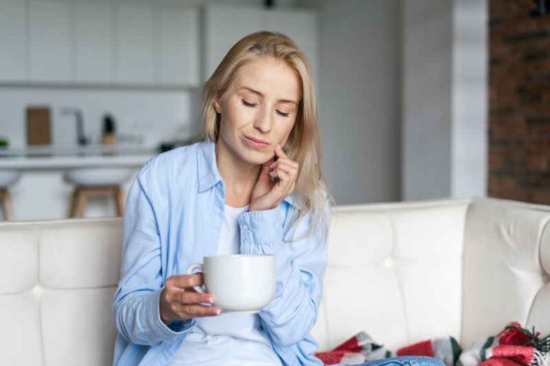 Woman with tooth sensitivity